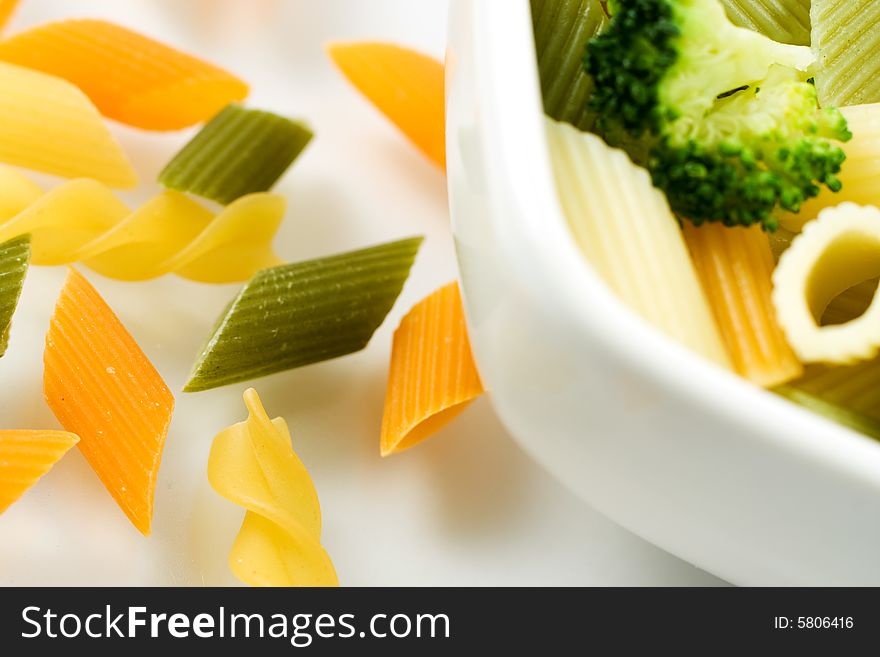 Italian noodles in bowl, Few kinds of pasta on white background