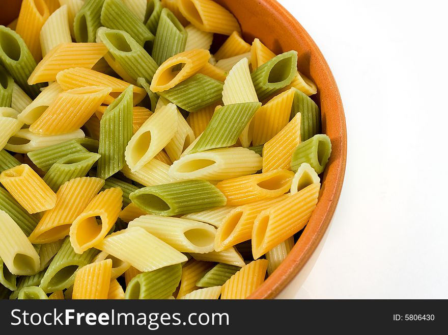 Close-up of pasta in bowl on white background