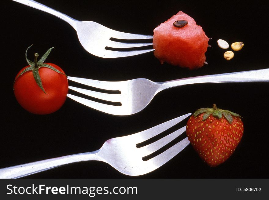 Illustration with forks and food that is red. Illustration with forks and food that is red.