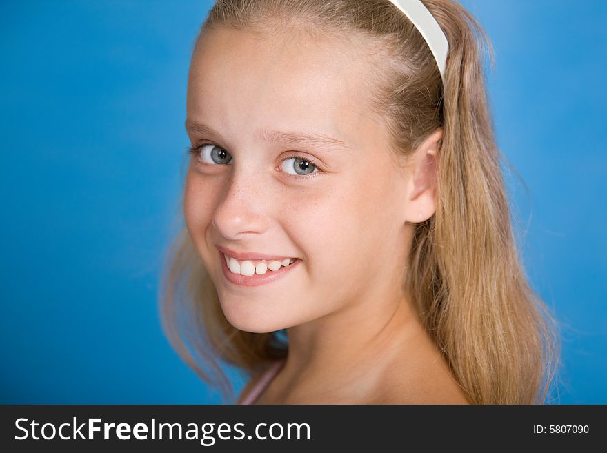 Close-up face portrait of young girl