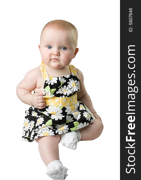 Baby posing with pretty dress on. Baby posing with pretty dress on.