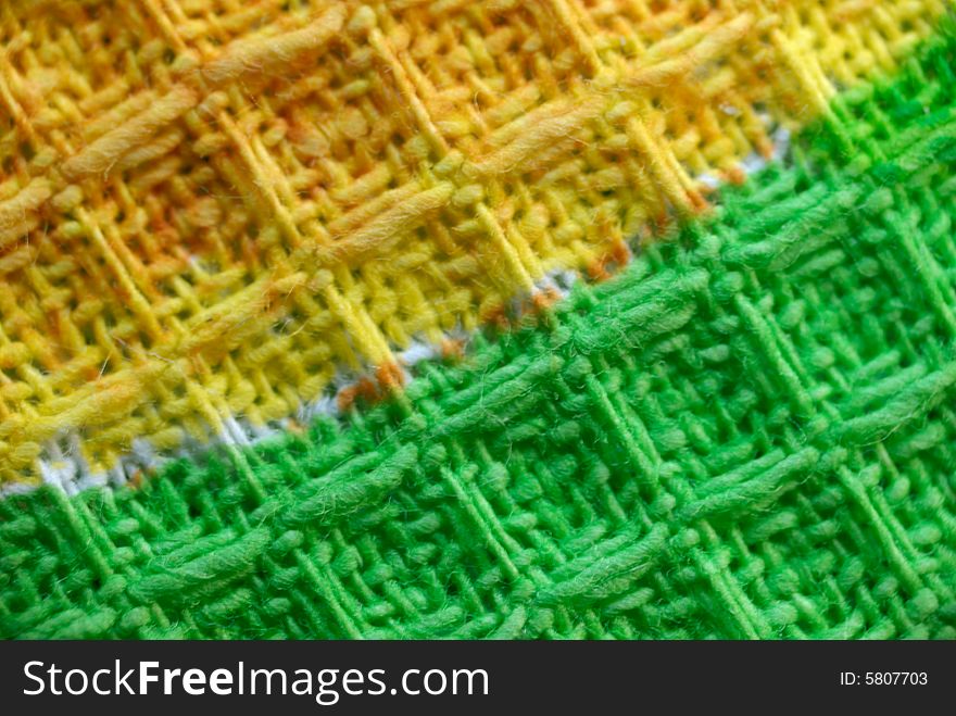 Macro pattern of yellow - green textile fabric