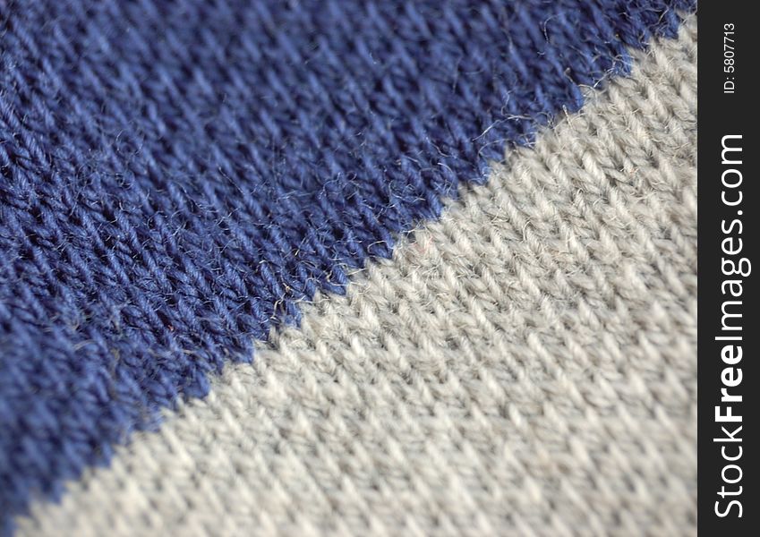 Macro pattern of blue - grey textile fabric