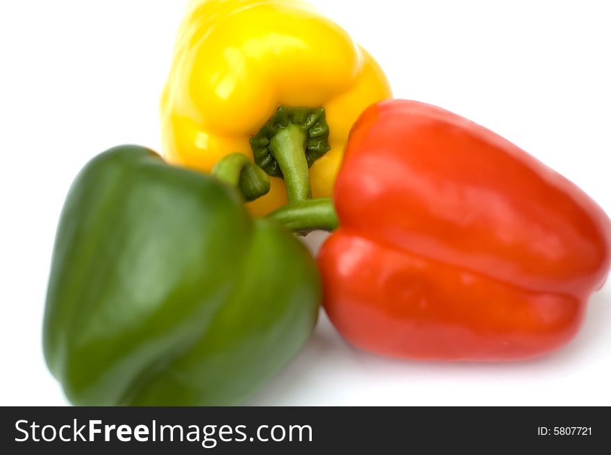 Yellow red and green pepper isolated on white background. Yellow red and green pepper isolated on white background