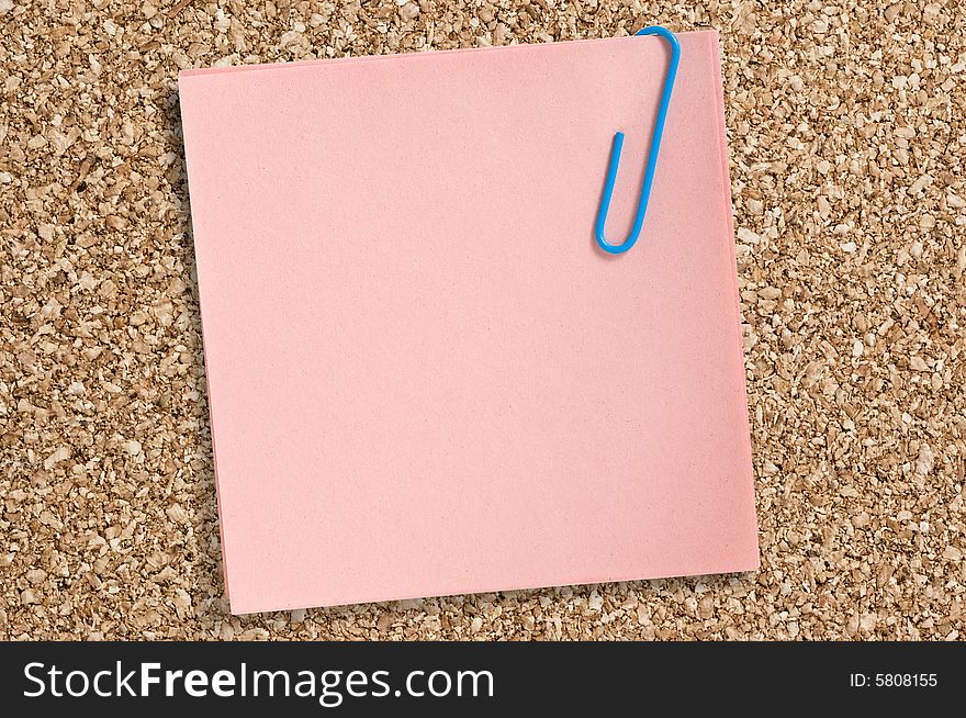 Pink paper note with clip