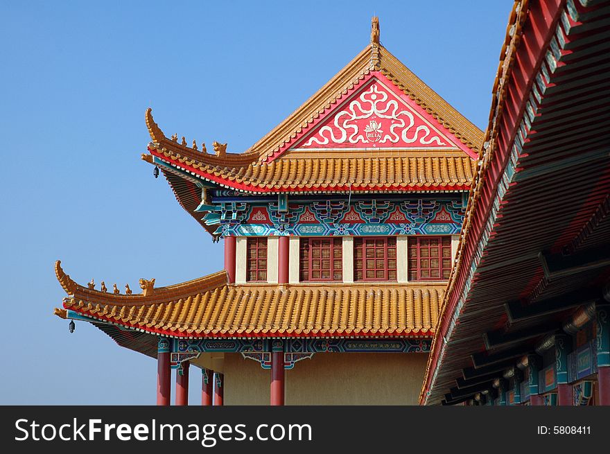 A photograph showing the detail of a Buddhist temple and Chinese architecture. A photograph showing the detail of a Buddhist temple and Chinese architecture.