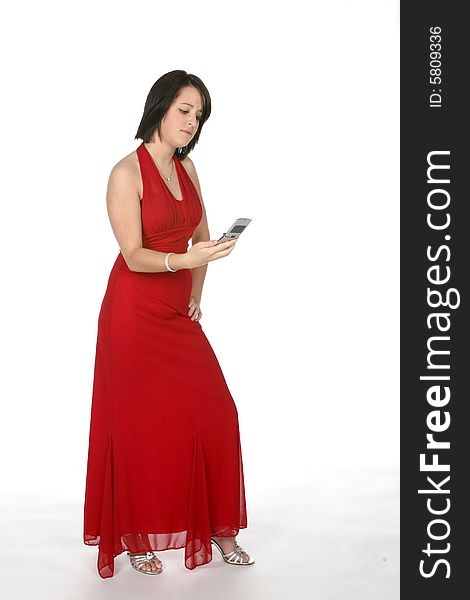 Teen in prom dress with cell phone. Teen in prom dress with cell phone