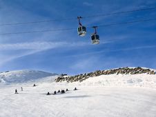 Snowboarders Under Cable Road Royalty Free Stock Photos Snowboarders Under Cable Road Royalty Free Stock Photos