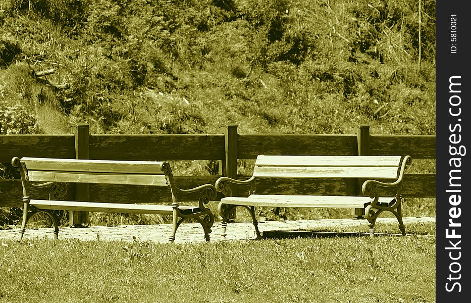 A relaxing shot of two benches in the main street of Selva Gardena. A relaxing shot of two benches in the main street of Selva Gardena