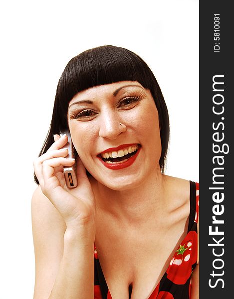 A young pretty woman in a studio and having fun talking
on the cell phone for white background in a tomato print dress. A young pretty woman in a studio and having fun talking
on the cell phone for white background in a tomato print dress.