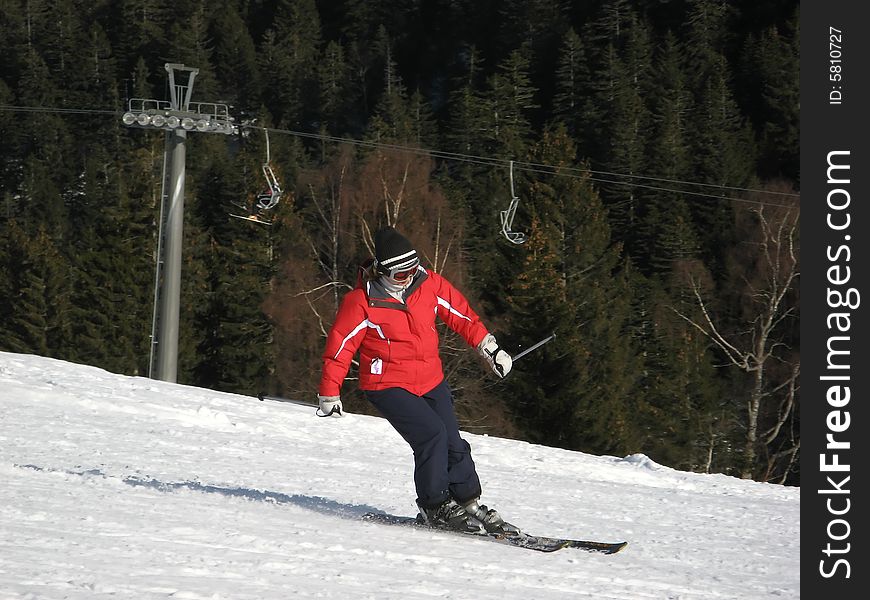 Woman on ski on the slope