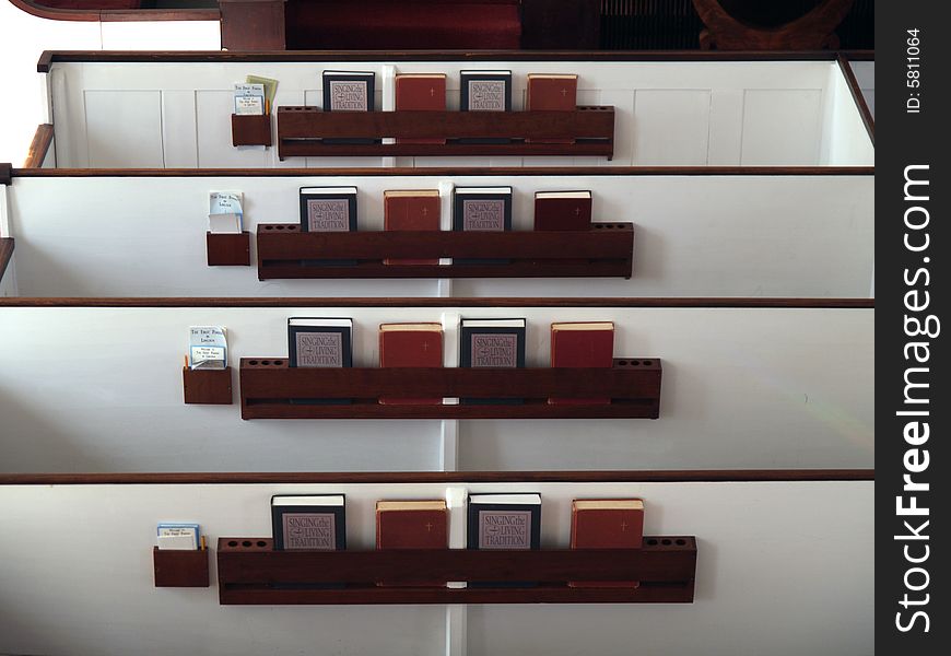 Church pews, seen from above, with hymnals. Church pews, seen from above, with hymnals.