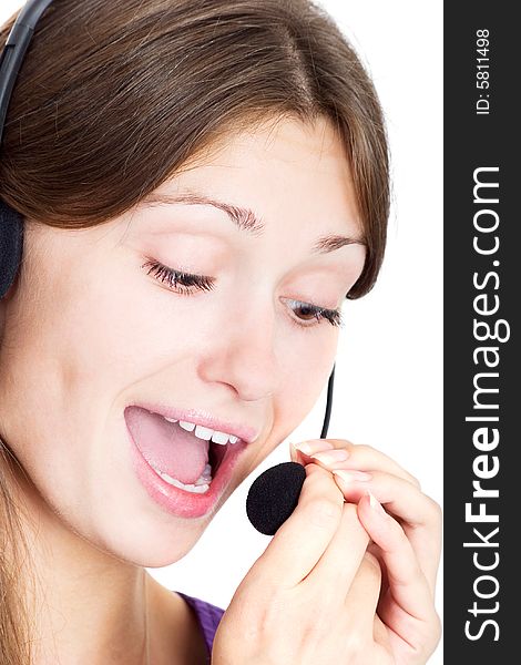 Portrait of a lovely lady with headset talking on white background. Portrait of a lovely lady with headset talking on white background