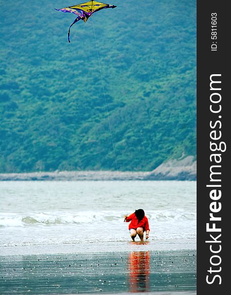 A girl flying the kite