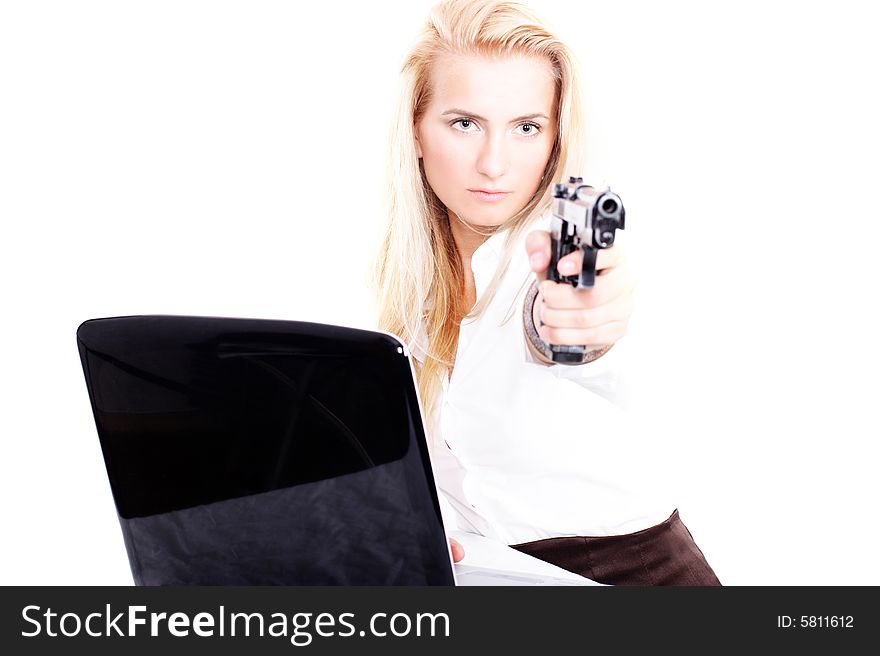 Portrait of a lovely lady with a gun and a laptop on white background. Portrait of a lovely lady with a gun and a laptop on white background