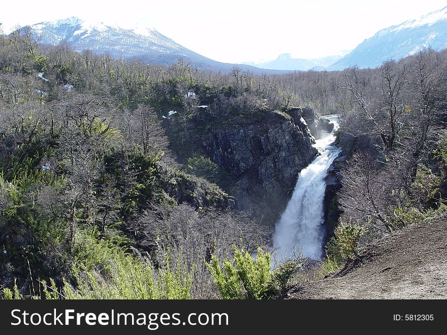 A stream between mountains like a little falls. A stream between mountains like a little falls