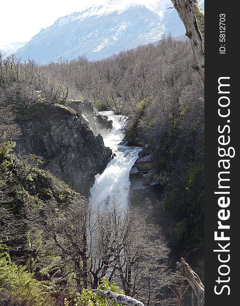 A stream between mountains like a little falls. A stream between mountains like a little falls