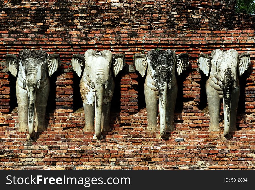 Thailand, Sukhothai or Sukothai was the capital of the Thai Empire founded in 1238. Wat Sorasak is a chedi with elephants figures encircling its base. Thailand, Sukhothai or Sukothai was the capital of the Thai Empire founded in 1238. Wat Sorasak is a chedi with elephants figures encircling its base.