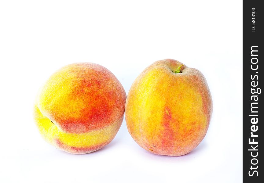 Two peach isolated on white. Two peach isolated on white