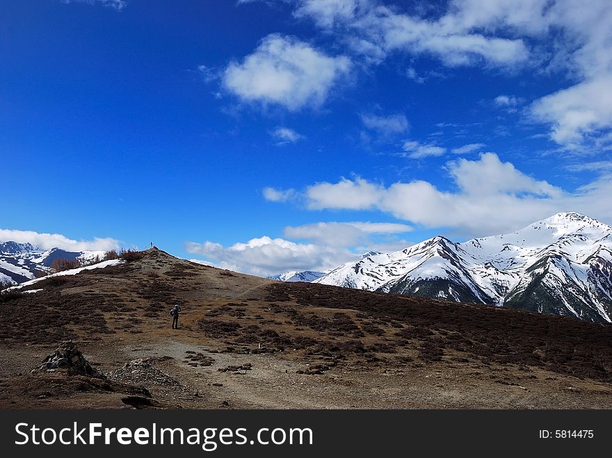 Trekking up to the top of a snow mountain.