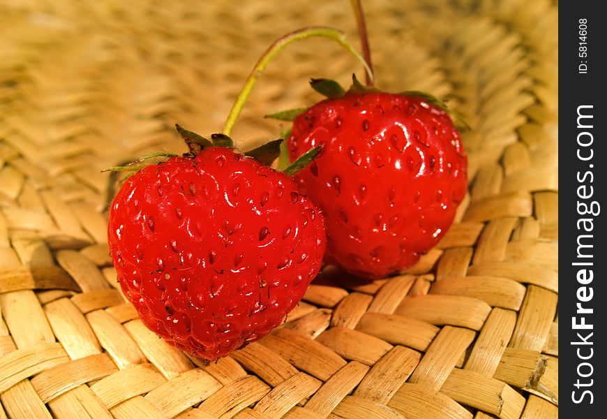 Strawberry in basket on bright summer day