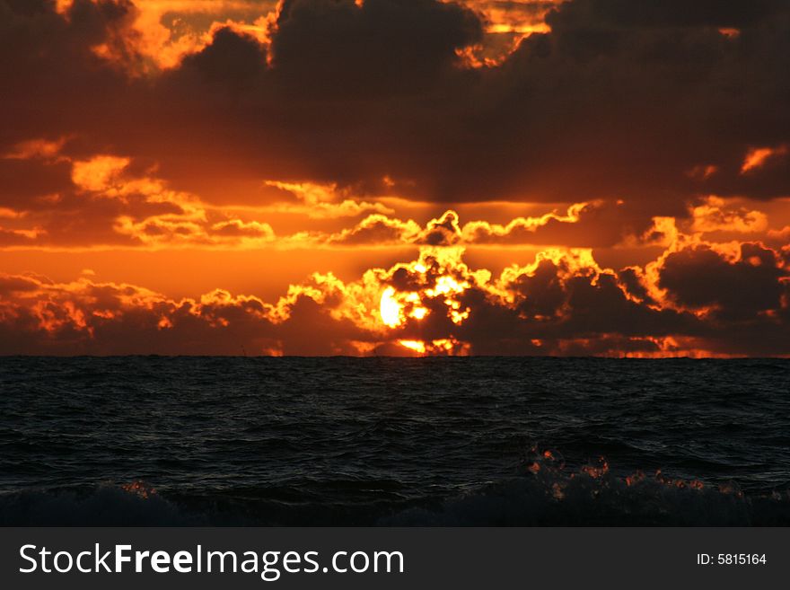 Sunset dark sky and Atlantic ocean. Sunset dark sky and Atlantic ocean
