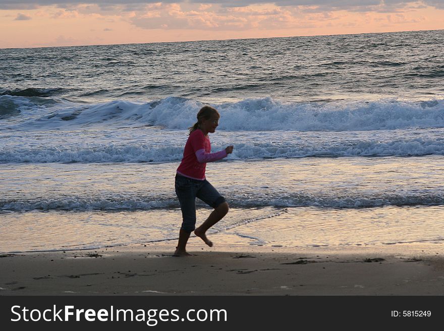 Running girl on the beach. Running girl on the beach