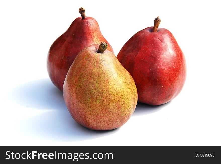 A shot of three ripe pears isolated on white