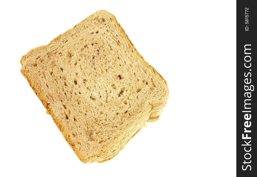 Up view of slices of bread piled on top of each other isolated on white. Up view of slices of bread piled on top of each other isolated on white