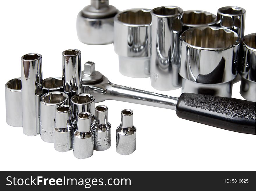 Set of chromeplated wrenches, on a white background