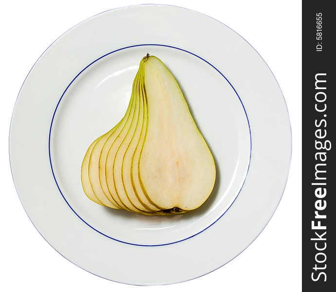 Pear on a plate, it is thin it is cut, combined as a ladder