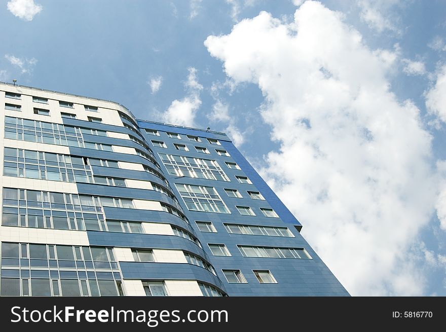 Business center with blue sky and clouds