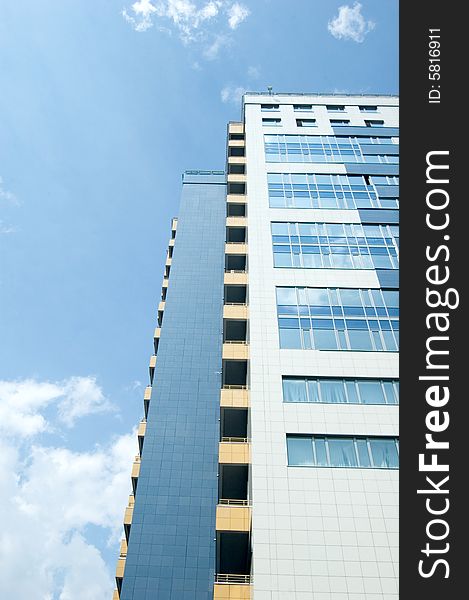 Business center with blue sky and clouds