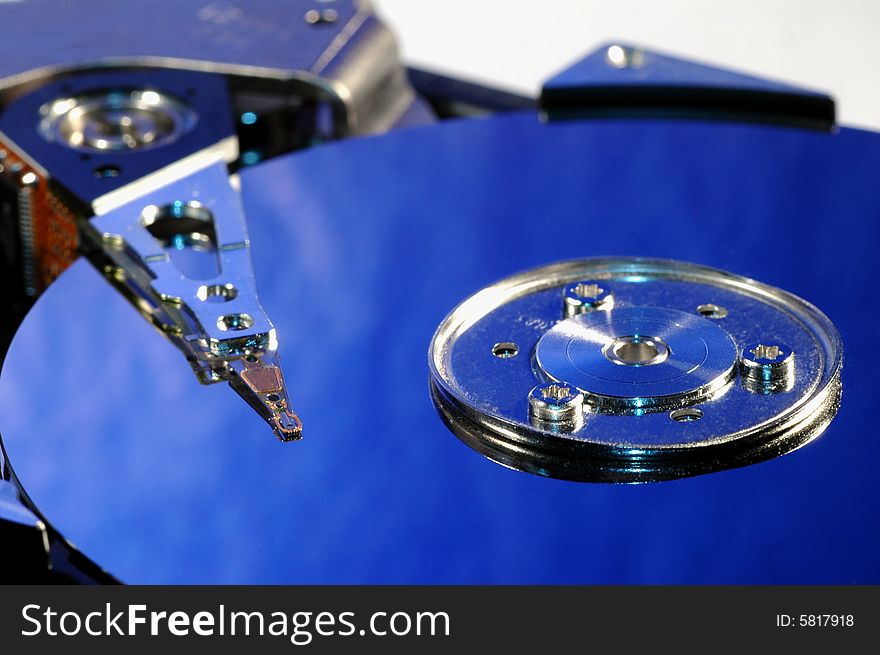 Close up of a blue opened hard drive. Close up of a blue opened hard drive