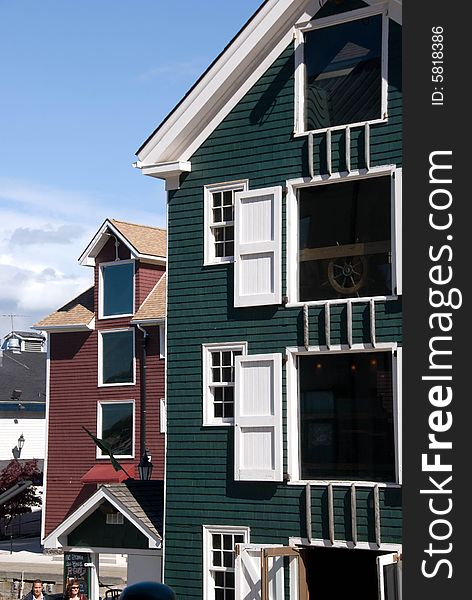 Maritime inspired building design contrasted against a blue sky. Maritime inspired building design contrasted against a blue sky.