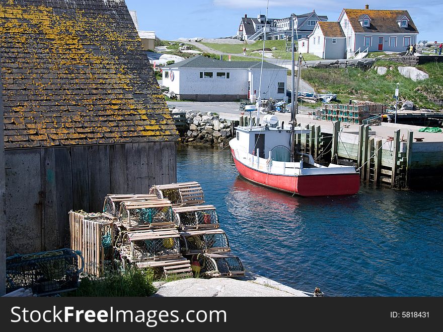 A view of Peggy's Cove in Nova Scotia,Canada. The little cove provides good protection from the Atlantic and is the heart of this fishing community.