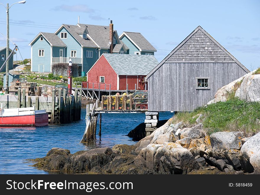 A view of Peggy's Cove in Nova Scotia,Canada. The little cove provides good protection from the Atlantic and is the heart of this fishing community.