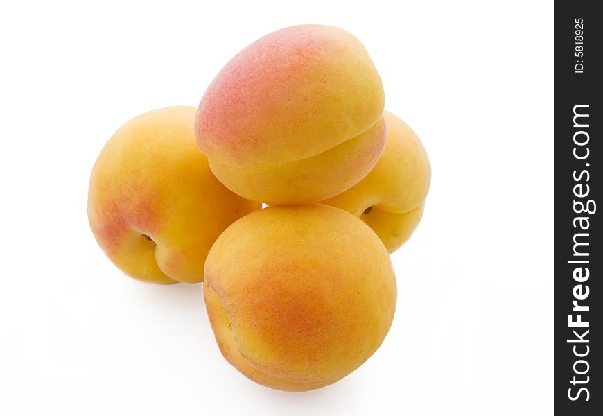 Pile Of Fresh Apricots Isolated On White