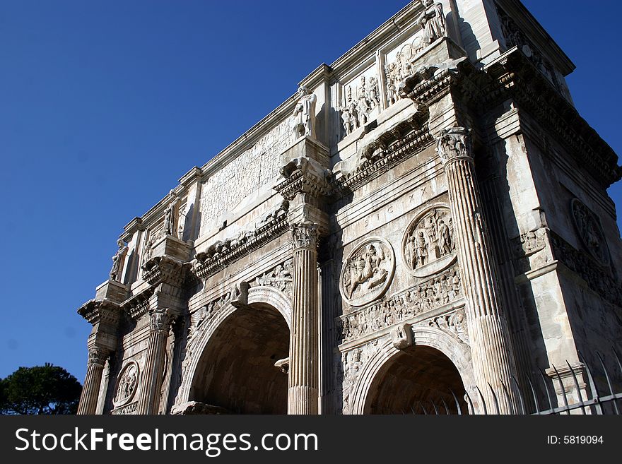 The ancient arch at the Roman Forum in Rome, Italy. The ancient arch at the Roman Forum in Rome, Italy.