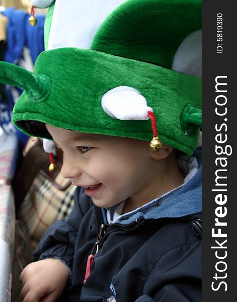 A young boy dressed up for the Mardi Gras celebration.