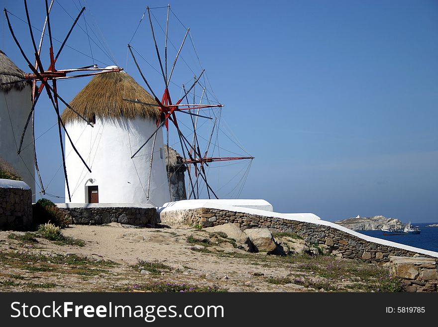 The famous white Windmills on Mykonos, a Greek island. The famous white Windmills on Mykonos, a Greek island.