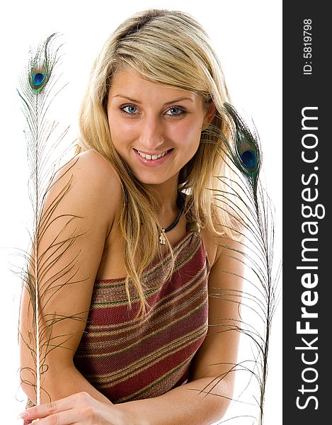 Portrait of beautiful girl with peacock a feather. Isolated over white background