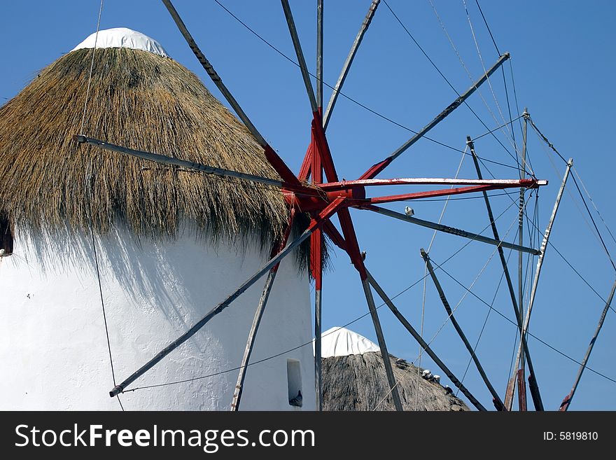 The famous white Windmills on Mykonos, a Greek island. The famous white Windmills on Mykonos, a Greek island.