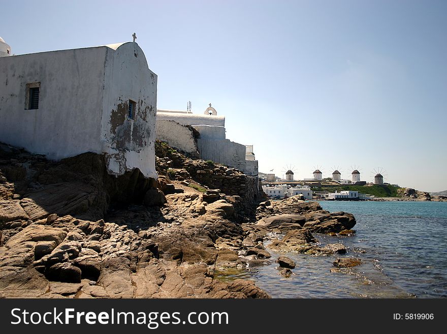 The famous White Church and windmills on Mykonos in the Greek Islands