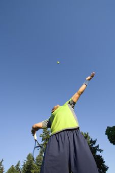 Man On Tennis Court Serving Tennis Ball Stock Photo Man On Tennis Court Serving Tennis Ball Stock Photo