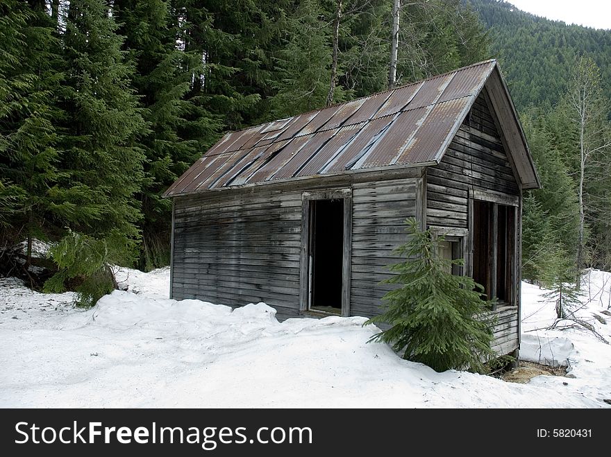 An old abandoned, empty, delapitated trapper's cabin in the British Columbia, Canada wilderness. An old abandoned, empty, delapitated trapper's cabin in the British Columbia, Canada wilderness.