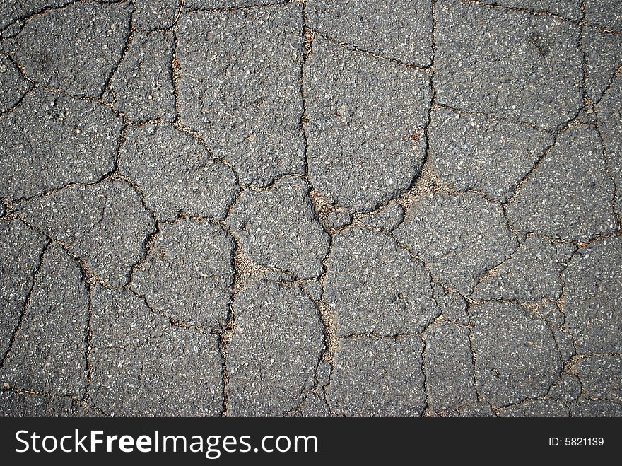 Old asphalt on the road