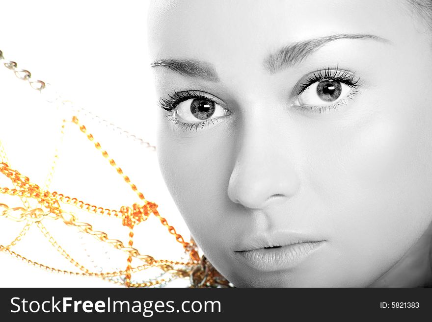 Portrait of a cute lady in monochrome with yellow beads on white background. Portrait of a cute lady in monochrome with yellow beads on white background