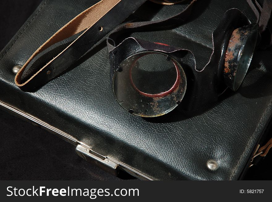 Old drivers' glasses on a black case