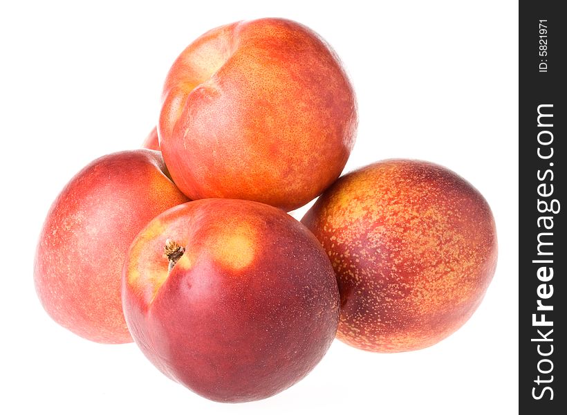 Fresh nectarines isolated on a white background